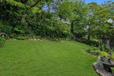 Welcome to this mint-condition Cape Cod nestled on a quiet - photo 19