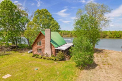 Are you looking for that perfect home on the river? This 2 - Lake Home For Sale in Bath Springs, Tennessee
