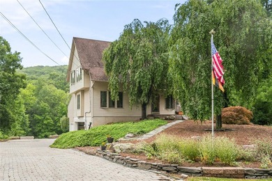 Welcome to 37 Rumsey Road, a one-of-a-kind custom home nestled - photo 2
