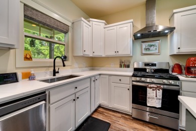 Come see this charming cottage in Hayesville. The home offers