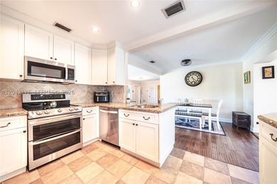 Nestled on a quiet cul-de-sac, 10690 NE 11t Ct offers the - photo 15