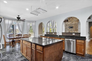 Experience expansive views of Kerr Lake from this impressive - photo 15