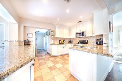 Nestled on a quiet cul-de-sac, 10690 NE 11t Ct offers the - photo 16