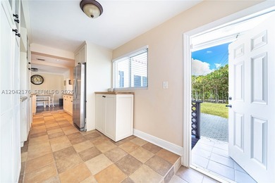 Nestled on a quiet cul-de-sac, 10690 NE 11t Ct offers the - photo 17