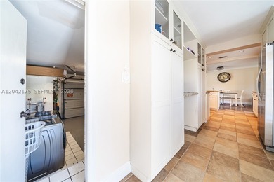 Nestled on a quiet cul-de-sac, 10690 NE 11t Ct offers the - photo 18