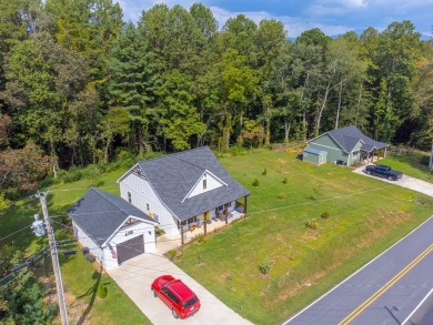 Come see this charming cottage in Hayesville. The home offers