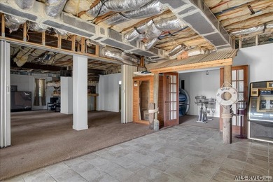Experience expansive views of Kerr Lake from this impressive - photo 45