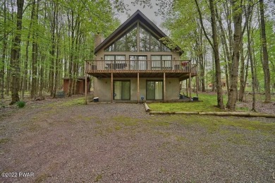 Beautiful Chalet home in a four-season amenity filled community - Lake Home For Sale in Lake Ariel, Pennsylvania
