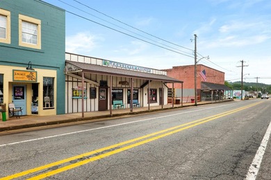 The CrossEyed Catfish on historic Main Street in Hardy is now - photo 4