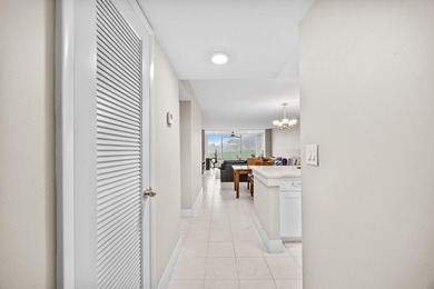 Wake up to tranquil lake and golf course views in this - photo 2