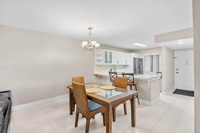 Wake up to tranquil lake and golf course views in this - photo 8