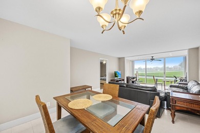 Wake up to tranquil lake and golf course views in this - photo 9
