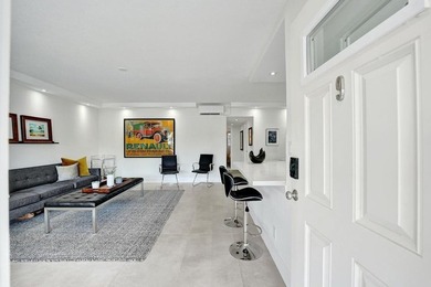 This one-of-a-kind fully renovated ground floor waterfront - photo 6