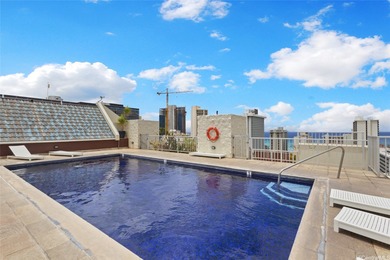 Live in the heart of Waikiki with golf course views and all the - photo 15