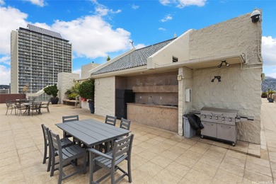 Live in the heart of Waikiki with golf course views and all the - photo 16
