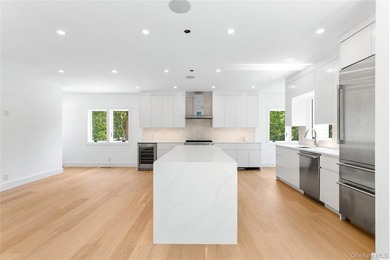 Set on 1.25 professionally landscaped acres bordering protected - photo 7