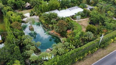 Prepare to be enchanted by this tropical oasis nestled in the - photo 1