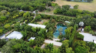Prepare to be enchanted by this tropical oasis nestled in the - photo 10