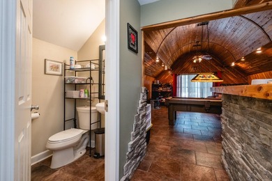 Exceptional lakefront retreat with stunning cedar game room - photo 10