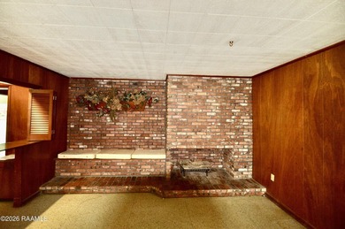 Welcome to a rare bayou-front opportunity offering privacy