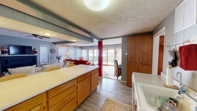 Enjoy lake life in this charming 2-bedroom, 1-bath cabin - photo 6