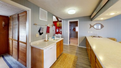 Enjoy lake life in this charming 2-bedroom, 1-bath cabin - photo 29