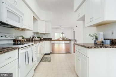 There's no place like home at Tomes Landing. This top-floor - photo 4