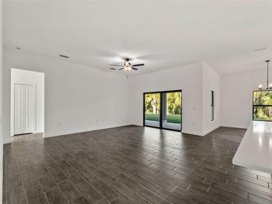 Tile throughout. Quartz countertops. Impact windows. Paver - photo 7