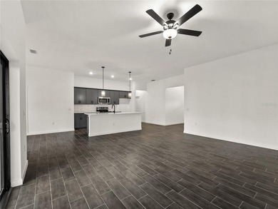 Tile throughout. Quartz countertops. Impact windows. Paver - photo 9