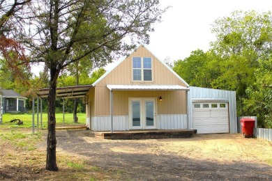 Gorgeous LAKE VIEW! Recently built 1br-1ba-1cpt-1 car garage on - Lake Home For Sale in Quinlan, Texas