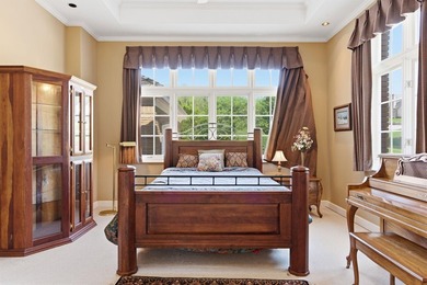Situated on a beautifully maintained half-acre lot along the - photo 31