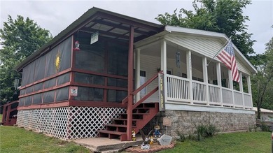 Don't miss this incredible lake retreat! This is a truly unique - photo 1