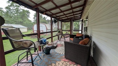 Don't miss this incredible lake retreat! This is a truly unique - photo 3