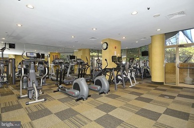 This well-maintained 1-bedroom condo offers hardwood floors, a - photo 36