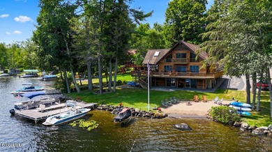 Experience the best of Adirondack lakefront living with this - photo 1