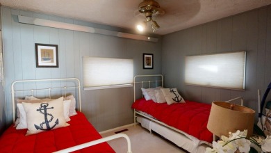 Enjoy lake life in this charming 2-bedroom, 1-bath cabin - photo 10