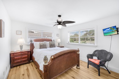 Step into this beautifully updated 3-bedroom island retreat on - photo 12
