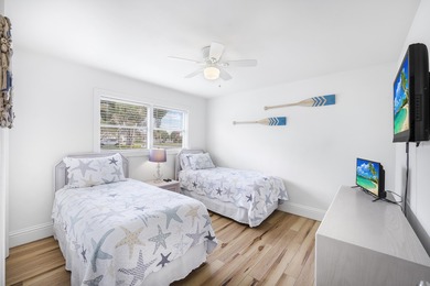 Step into this beautifully updated 3-bedroom island retreat on - photo 13