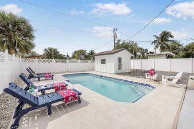 Step into this beautifully updated 3-bedroom island retreat on - photo 16