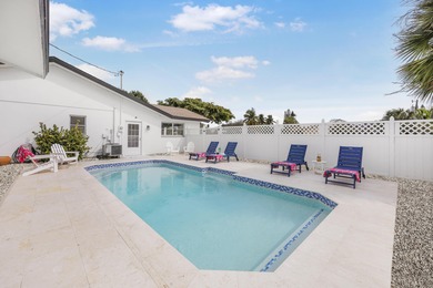 Step into this beautifully updated 3-bedroom island retreat on - photo 17