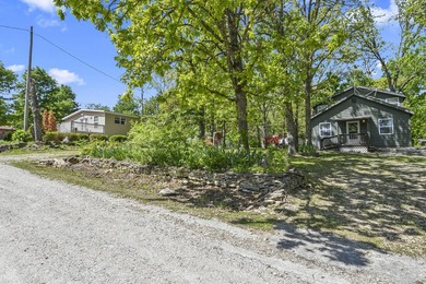 A charming bungalow-style cabin nestled on three spacious lots - photo 8