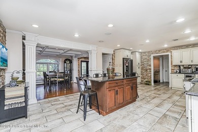 Welcome to 699 Ionia Avenue, a stunning brick-front center hall - photo 12