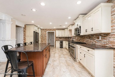 Welcome to 699 Ionia Avenue, a stunning brick-front center hall - photo 14