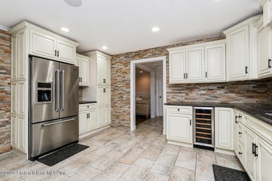 Welcome to 699 Ionia Avenue, a stunning brick-front center hall - photo 16