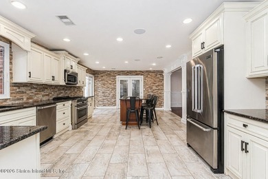 Welcome to 699 Ionia Avenue, a stunning brick-front center hall - photo 17