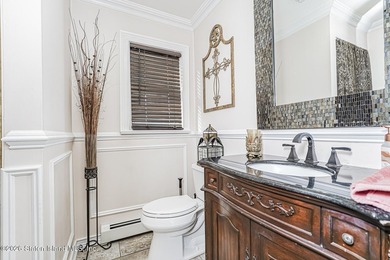 Welcome to 699 Ionia Avenue, a stunning brick-front center hall - photo 23
