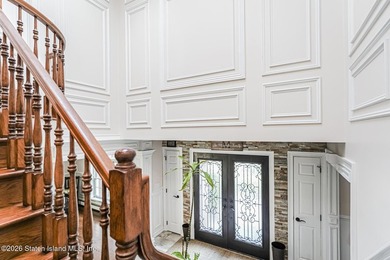 Welcome to 699 Ionia Avenue, a stunning brick-front center hall - photo 25