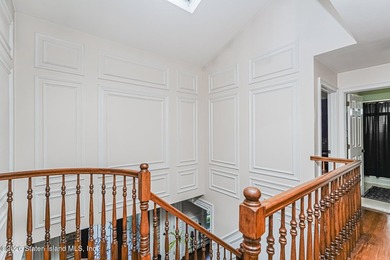 Welcome to 699 Ionia Avenue, a stunning brick-front center hall - photo 27