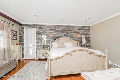 Welcome to 699 Ionia Avenue, a stunning brick-front center hall - photo 28