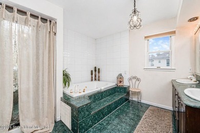 Welcome to 699 Ionia Avenue, a stunning brick-front center hall - photo 31